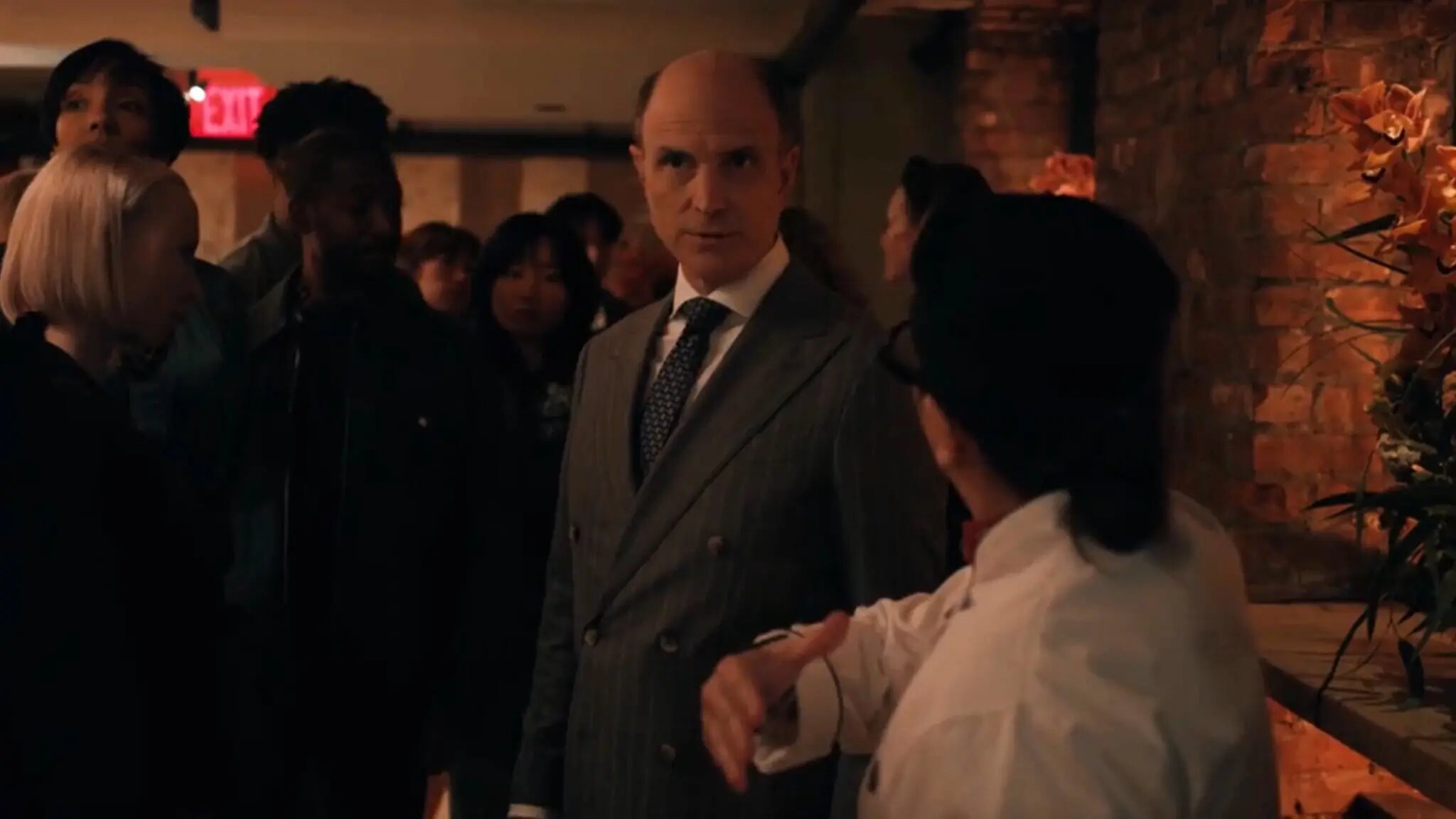 Drew Moore as Mr. Montebello in the restaurant