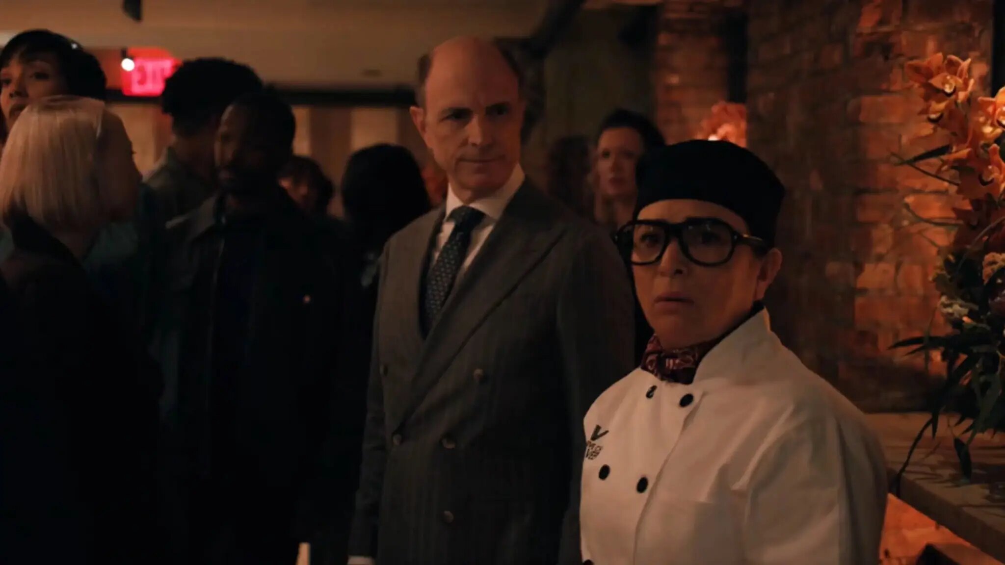 Drew Moore as Mr. Montebello with Pamela Adlon as Chef Veev