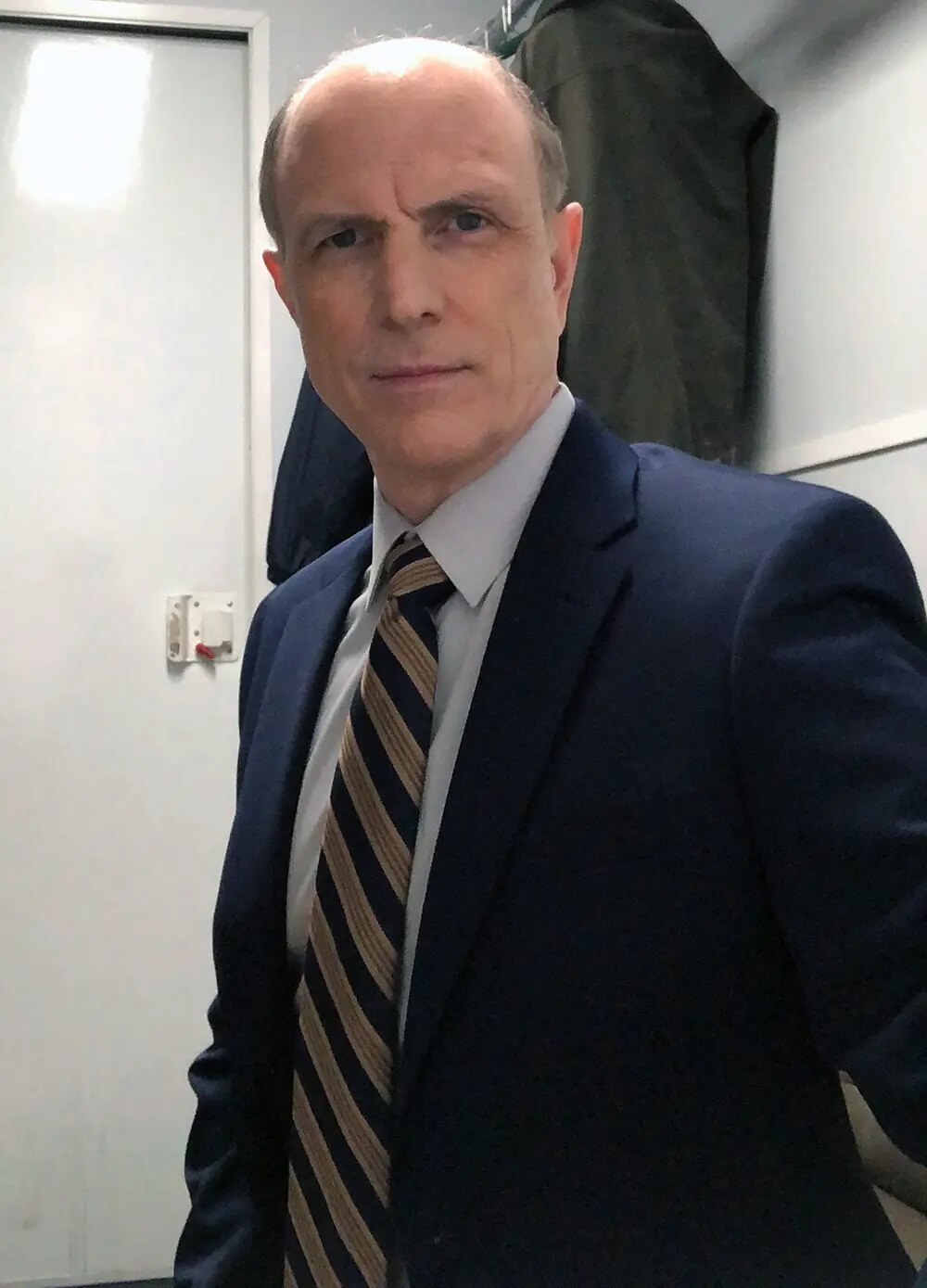 Drew Moore on set as Byron Gedney