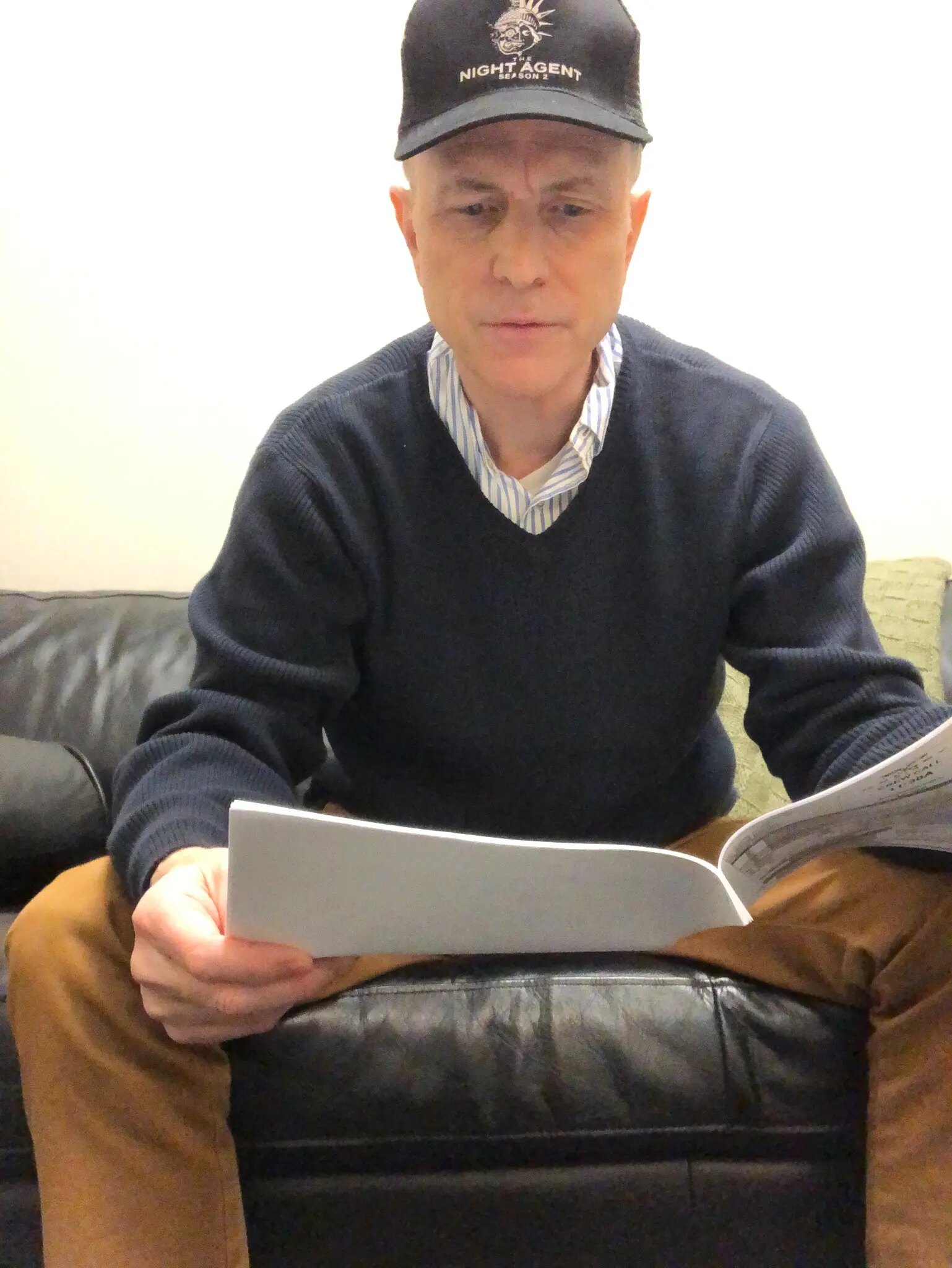 Drew Moore reading his sides before shooting The Night Agent
